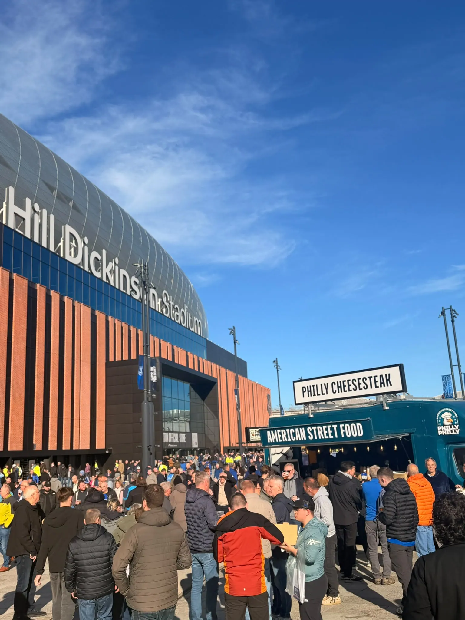 Crowds at the Philly Philly truck trading outside a stadium on event day